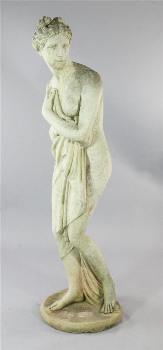 A large reconstituted stone garden figure of Pandora, H.5ft 2in.